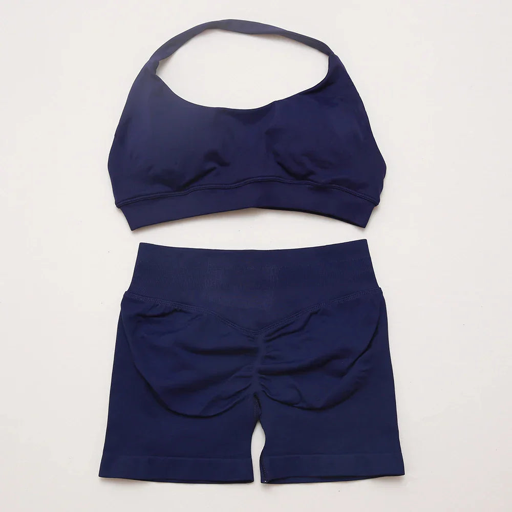 Elite Dynamic Impact Gym Set featuring a matching performance top and leggings with compression support, breathable fabric, and a sleek athletic design