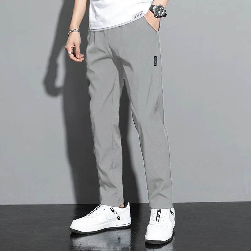 Elite Mens Summer Sport Pants made with lightweight, breathable fabric and a relaxed fit for comfort and mobility during warm-weather workouts