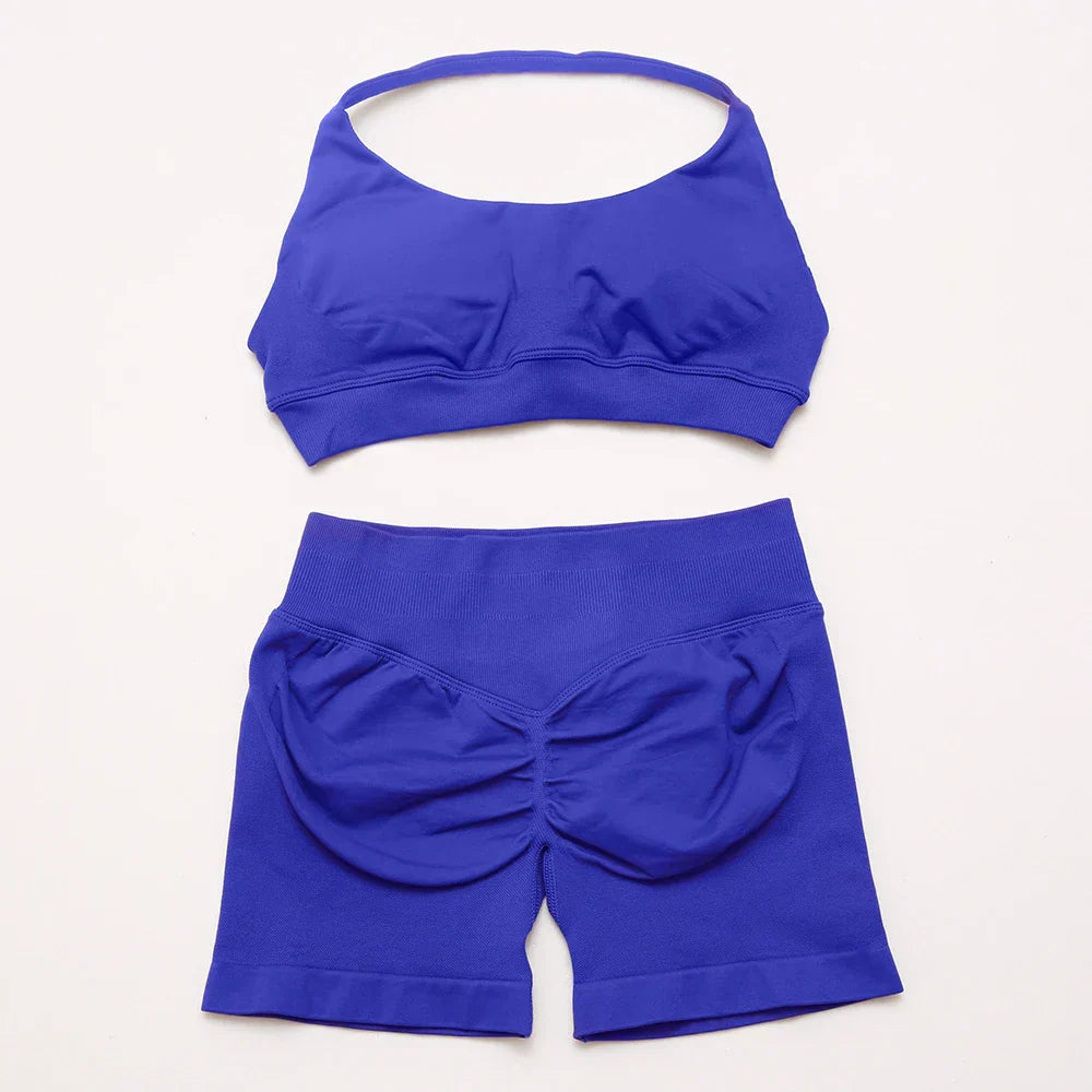 Elite Dynamic Impact Gym Set featuring a matching performance top and leggings with compression support, breathable fabric, and a sleek athletic design