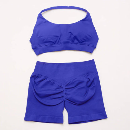 Elite Dynamic Impact Gym Set featuring a matching performance top and leggings with compression support, breathable fabric, and a sleek athletic design