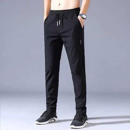Elite Mens Summer Sport Pants made with lightweight, breathable fabric and a relaxed fit for comfort and mobility during warm-weather workouts