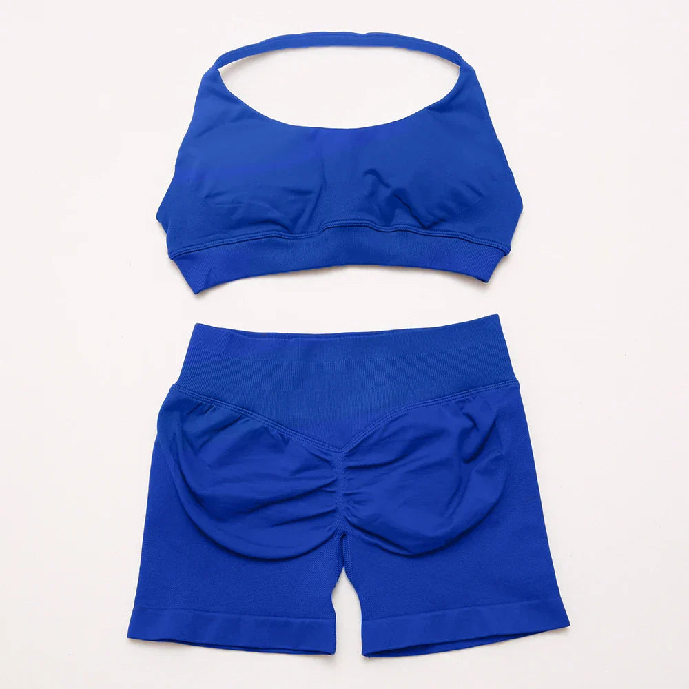 Elite Dynamic Impact Gym Set featuring a matching performance top and leggings with compression support, breathable fabric, and a sleek athletic design