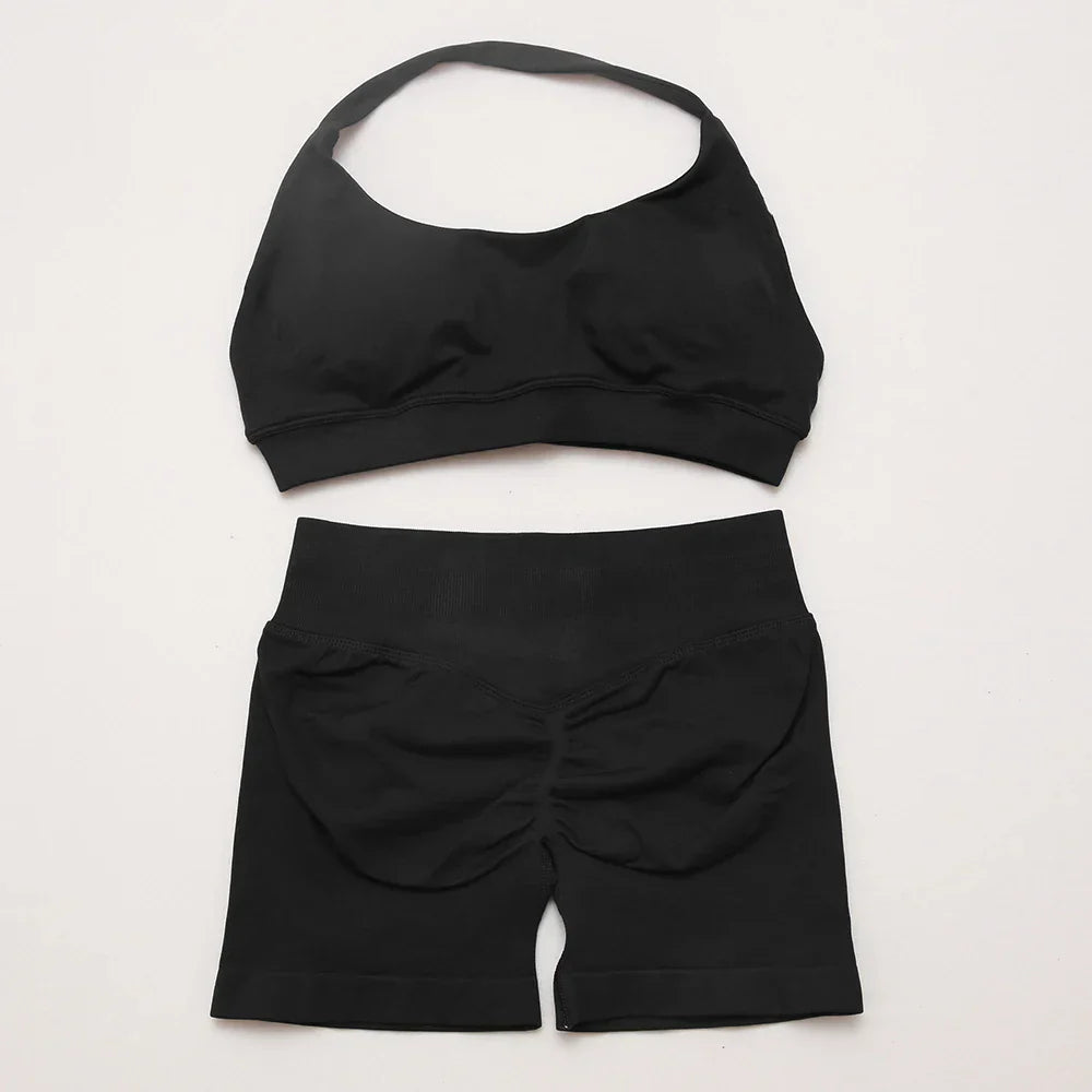 Elite Dynamic Impact Gym Set featuring a matching performance top and leggings with compression support, breathable fabric, and a sleek athletic design