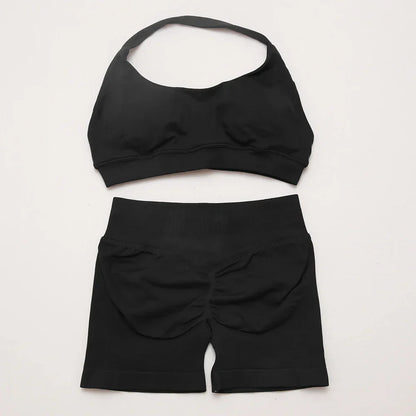 Elite Dynamic Impact Gym Set featuring a matching performance top and leggings with compression support, breathable fabric, and a sleek athletic design