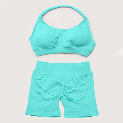 Elite Dynamic Impact Gym Set featuring a matching performance top and leggings with compression support, breathable fabric, and a sleek athletic design