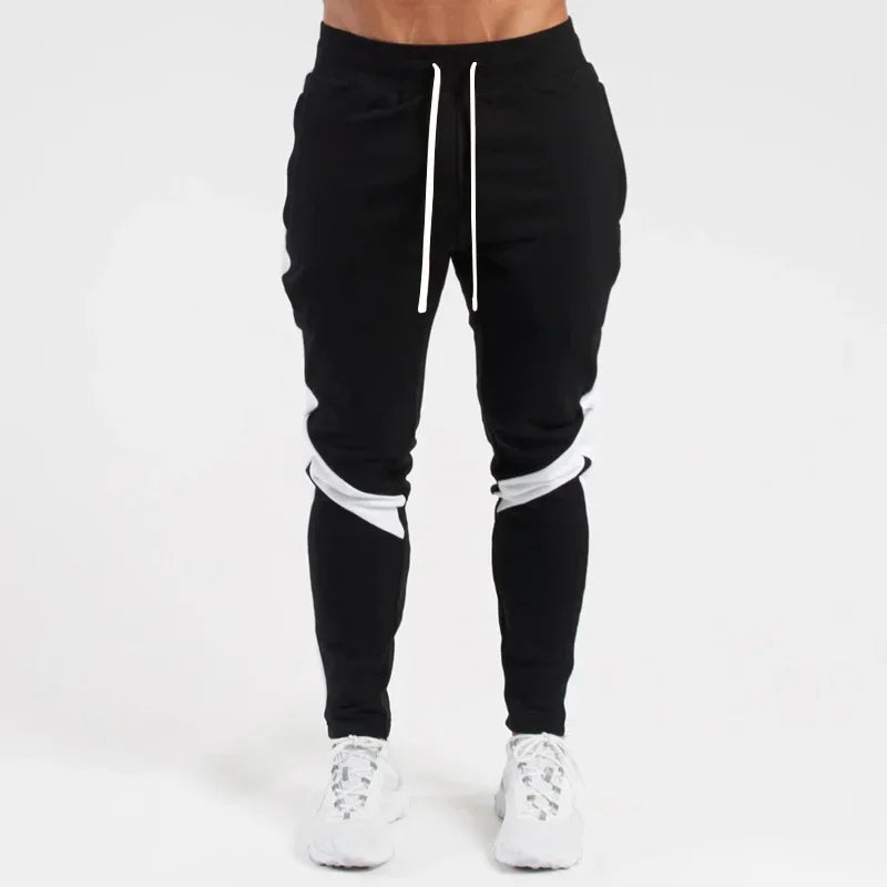 EliteFit Men Jogger Pants with tapered legs, zippered pockets, and breathable stretch fabric—designed for active comfort and modern athletic style.