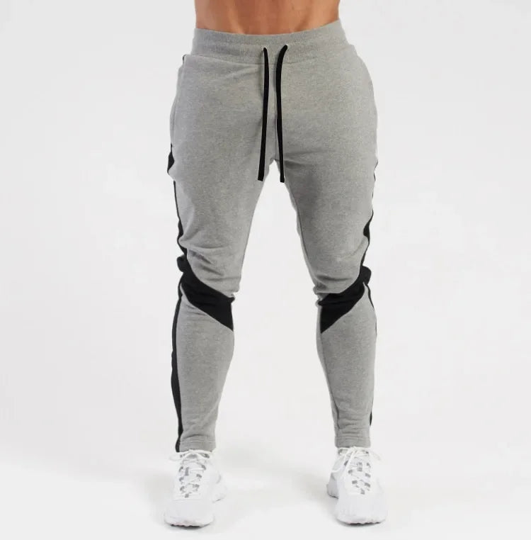 EliteFit Men Jogger Pants with tapered legs, zippered pockets, and breathable stretch fabric—designed for active comfort and modern athletic style.