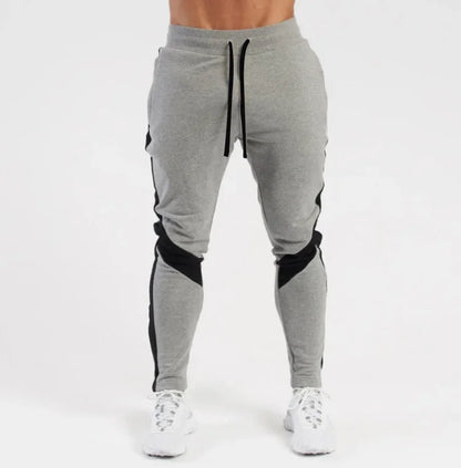 EliteFit Men Jogger Pants with tapered legs, zippered pockets, and breathable stretch fabric—designed for active comfort and modern athletic style.