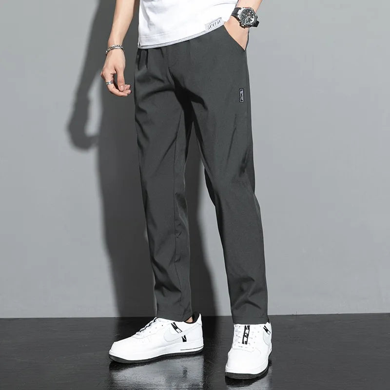 Elite Mens Summer Sport Pants made with lightweight, breathable fabric and a relaxed fit for comfort and mobility during warm-weather workouts