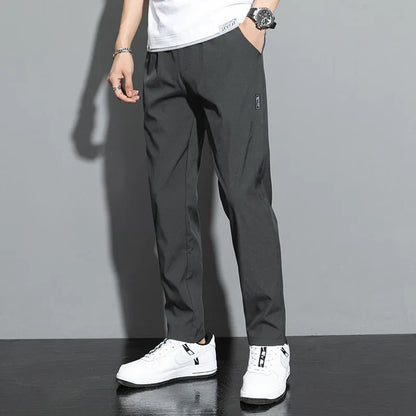 Elite Mens Summer Sport Pants made with lightweight, breathable fabric and a relaxed fit for comfort and mobility during warm-weather workouts
