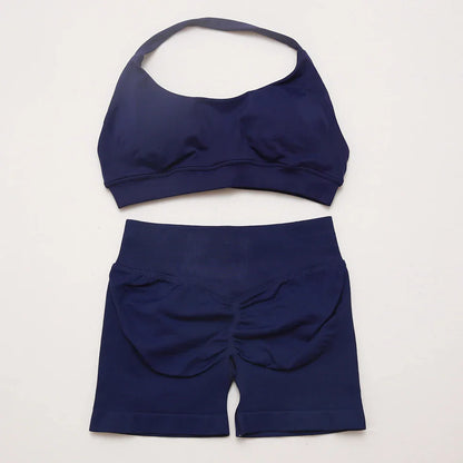 Elite Dynamic Impact Gym Set featuring a matching performance top and leggings with compression support, breathable fabric, and a sleek athletic design