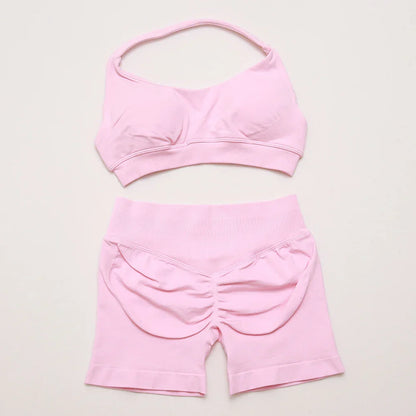 Elite Dynamic Impact Gym Set featuring a matching performance top and leggings with compression support, breathable fabric, and a sleek athletic design