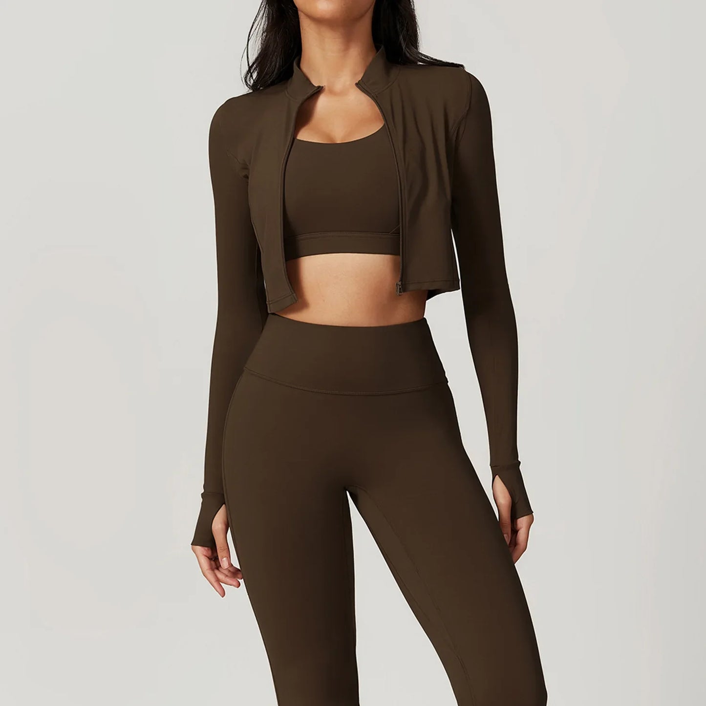 Elite 3-Piece Yoga Set including sports bra, high-waist leggings, and crop top—designed for stretch, support, and comfort during workouts or yoga sessions.
