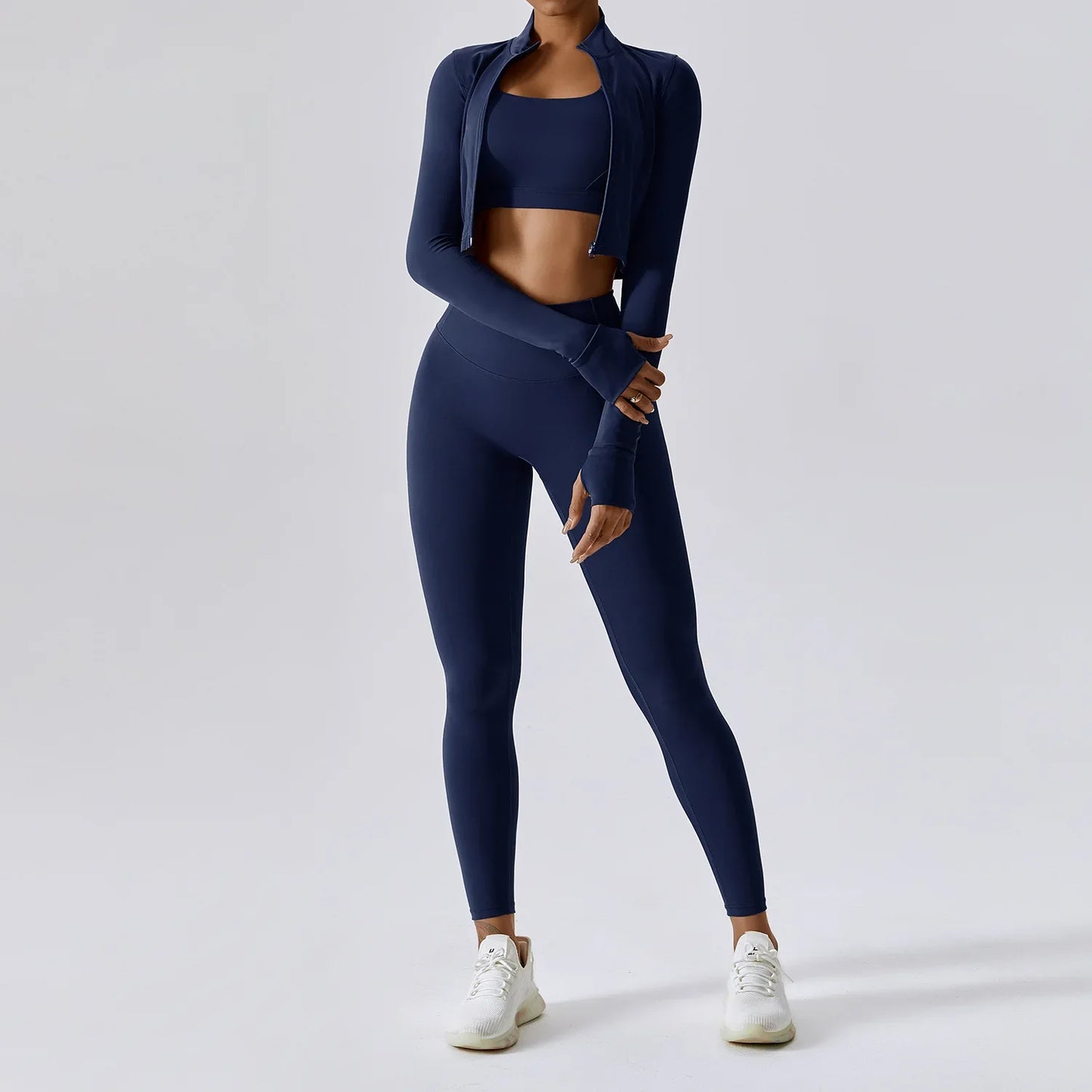 Elite 3-Piece Yoga Set including sports bra, high-waist leggings, and crop top—designed for stretch, support, and comfort during workouts or yoga sessions.