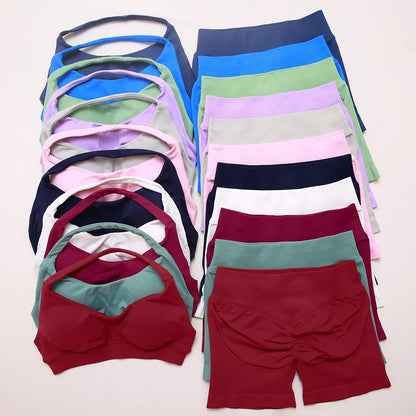 Elite Dynamic Impact Gym Set featuring a matching performance top and leggings with compression support, breathable fabric, and a sleek athletic design