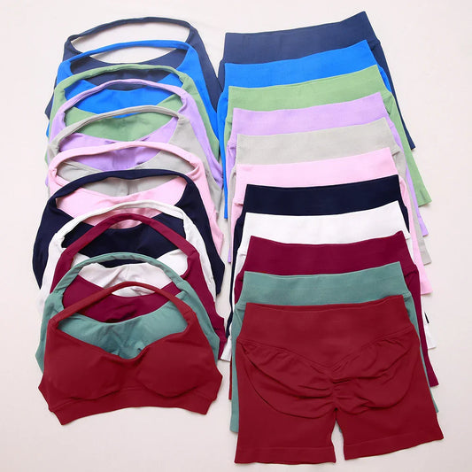 Elite Dynamic Impact Gym Set featuring a matching performance top and leggings with compression support, breathable fabric, and a sleek athletic design