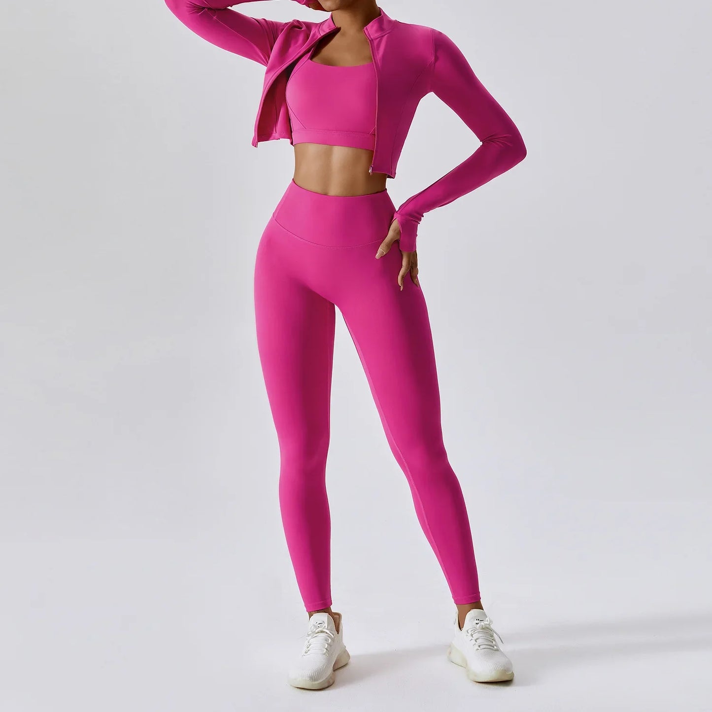 Elite 3-Piece Yoga Set including sports bra, high-waist leggings, and crop top—designed for stretch, support, and comfort during workouts or yoga sessions.