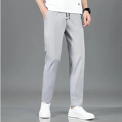 Elite Mens Summer Sport Pants made with lightweight, breathable fabric and a relaxed fit for comfort and mobility during warm-weather workouts