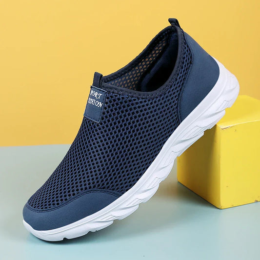 Elite Men Slip-On Sneakers with a sleek, laceless design, breathable knit upper, and cushioned sole for easy, all-day comfort and everyday wear