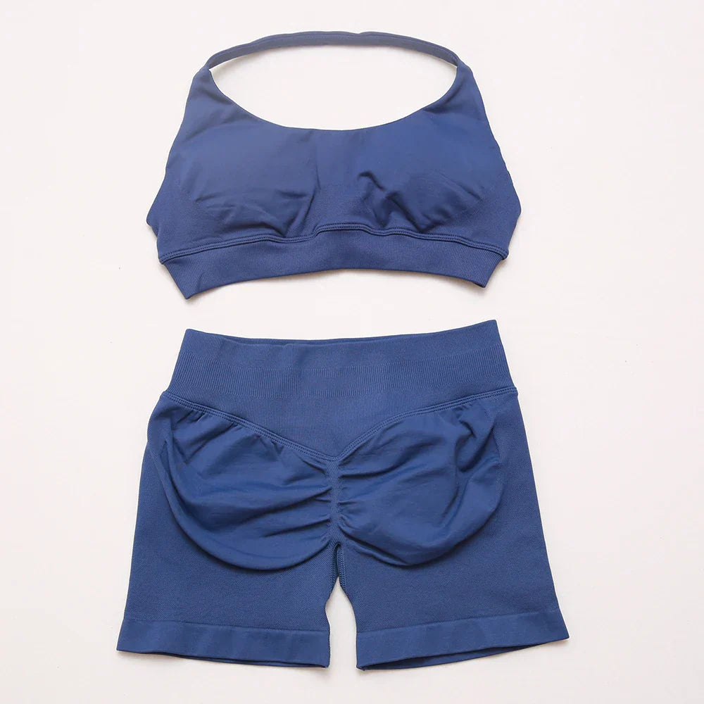 Elite Dynamic Impact Gym Set featuring a matching performance top and leggings with compression support, breathable fabric, and a sleek athletic design