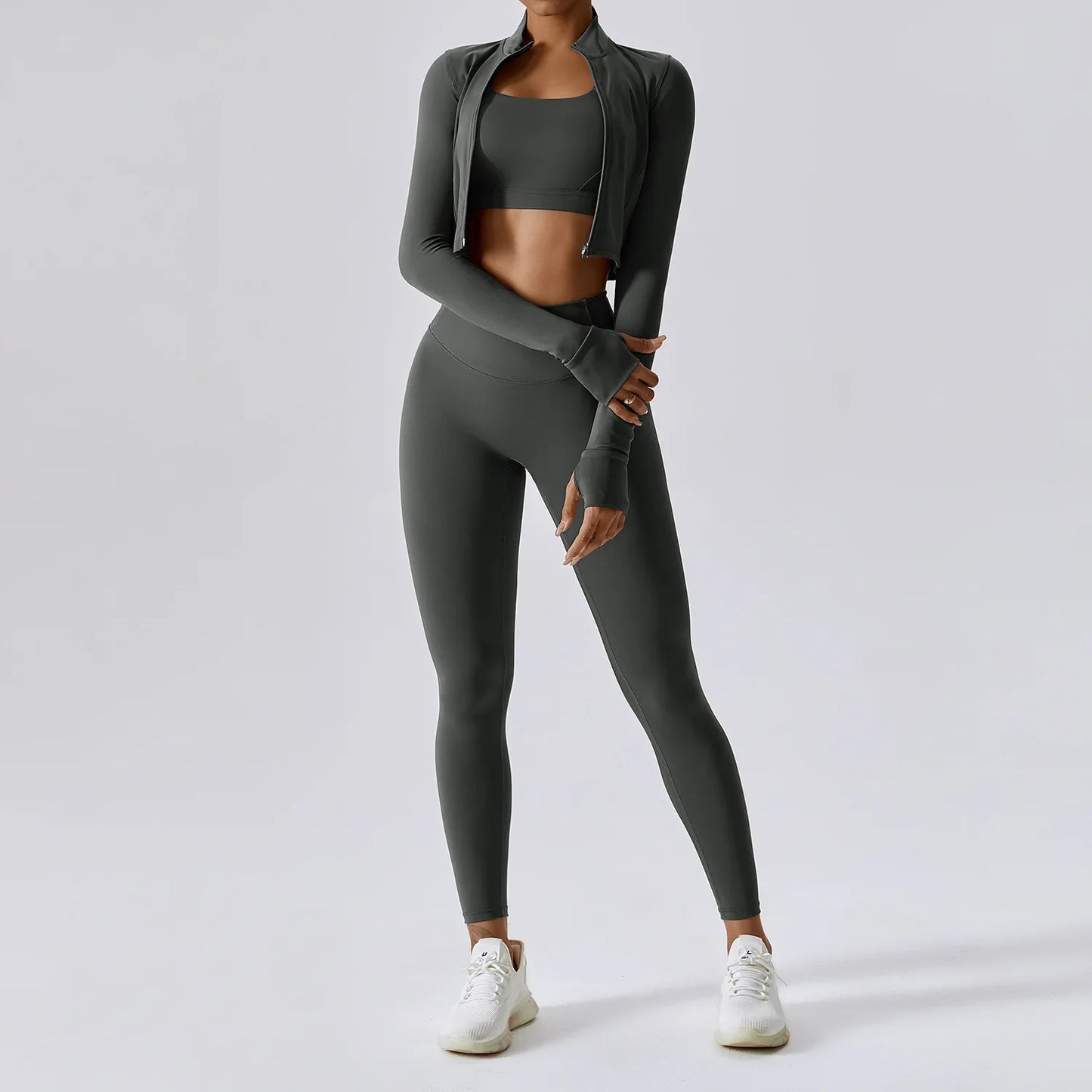 Elite 3-Piece Yoga Set including sports bra, high-waist leggings, and crop top—designed for stretch, support, and comfort during workouts or yoga sessions.