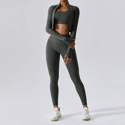 Elite 3-Piece Yoga Set including sports bra, high-waist leggings, and crop top—designed for stretch, support, and comfort during workouts or yoga sessions.