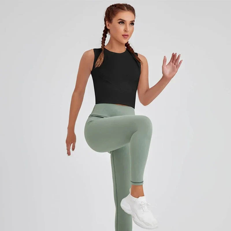 Elite Summer Fit Sports Top with breathable, moisture-wicking fabric and a flattering athletic cut—designed for cool comfort during warm-weather workouts.