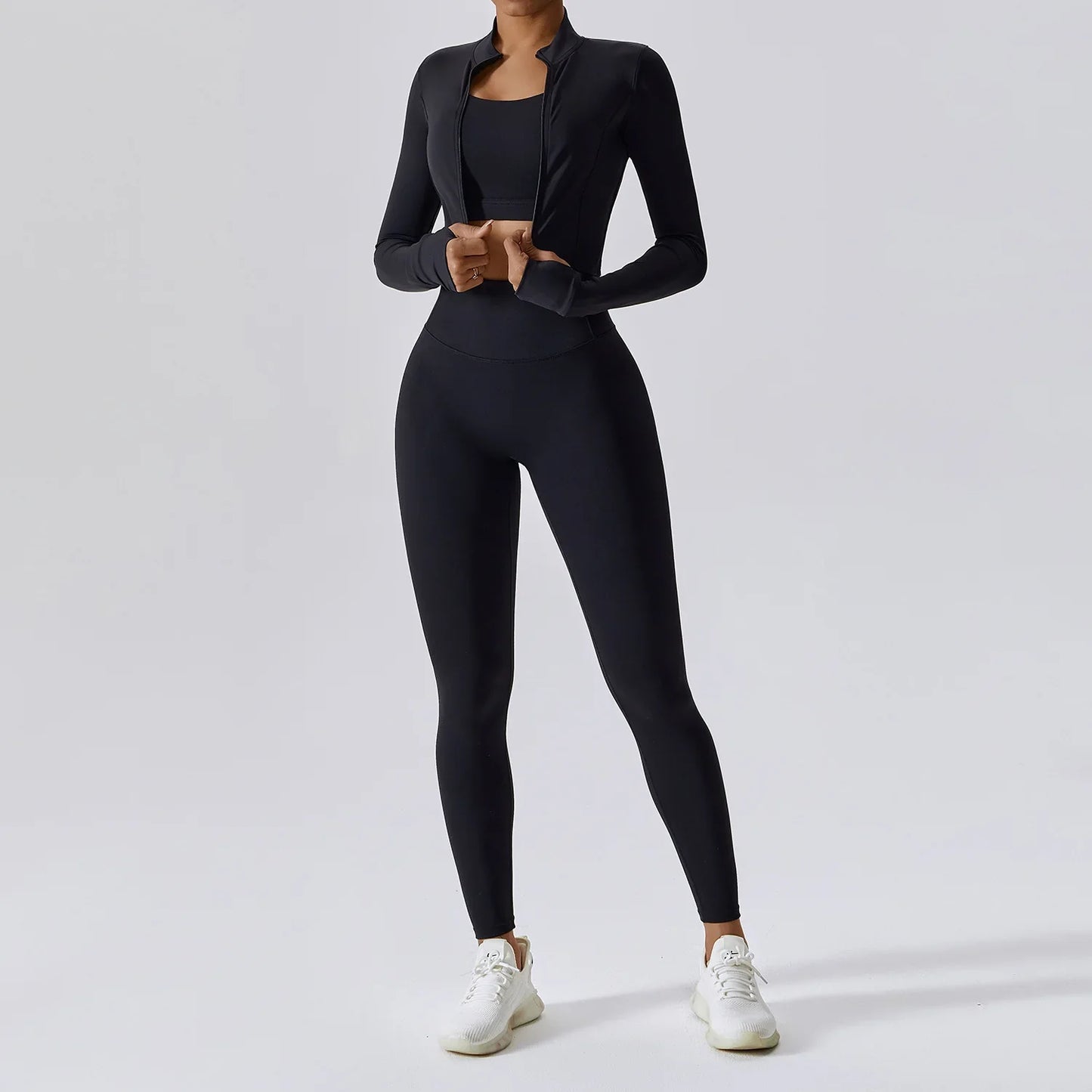Elite 3-Piece Yoga Set including sports bra, high-waist leggings, and crop top—designed for stretch, support, and comfort during workouts or yoga sessions.