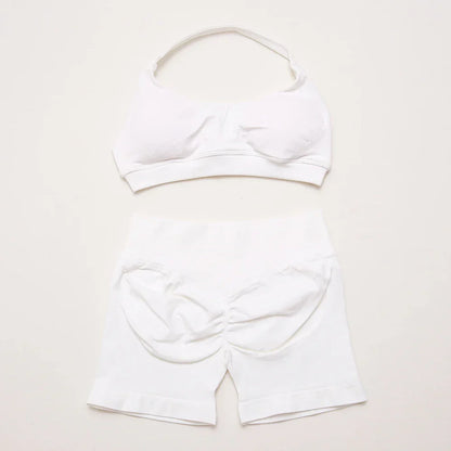 Elite Dynamic Impact Gym Set featuring a matching performance top and leggings with compression support, breathable fabric, and a sleek athletic design