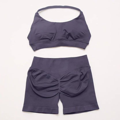 Elite Dynamic Impact Gym Set featuring a matching performance top and leggings with compression support, breathable fabric, and a sleek athletic design