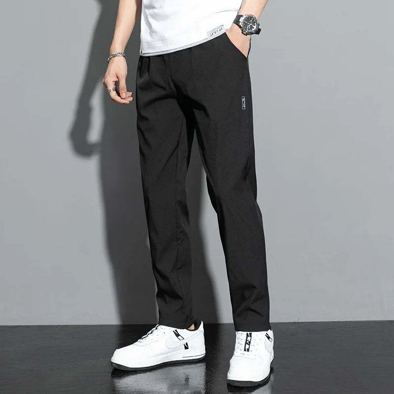 Elite Mens Summer Sport Pants made with lightweight, breathable fabric and a relaxed fit for comfort and mobility during warm-weather workouts