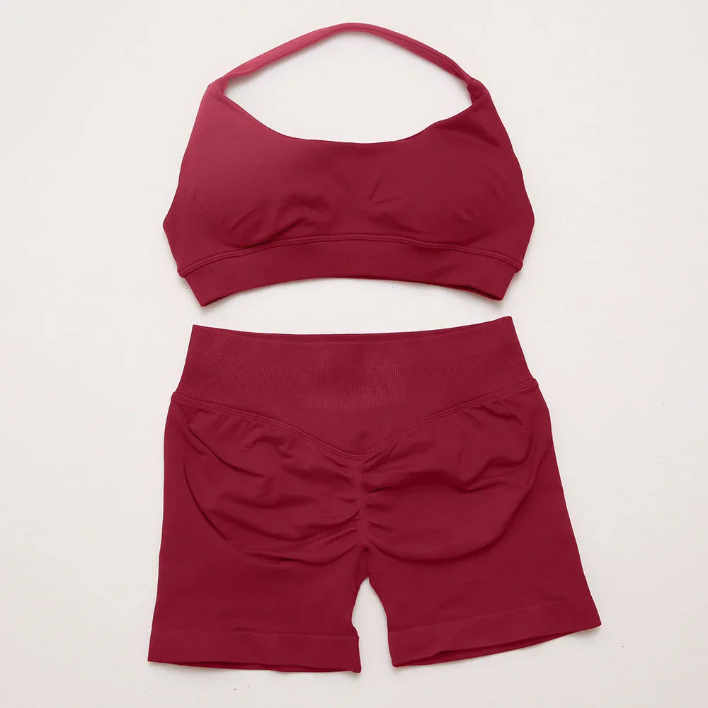 Elite Dynamic Impact Gym Set featuring a matching performance top and leggings with compression support, breathable fabric, and a sleek athletic design