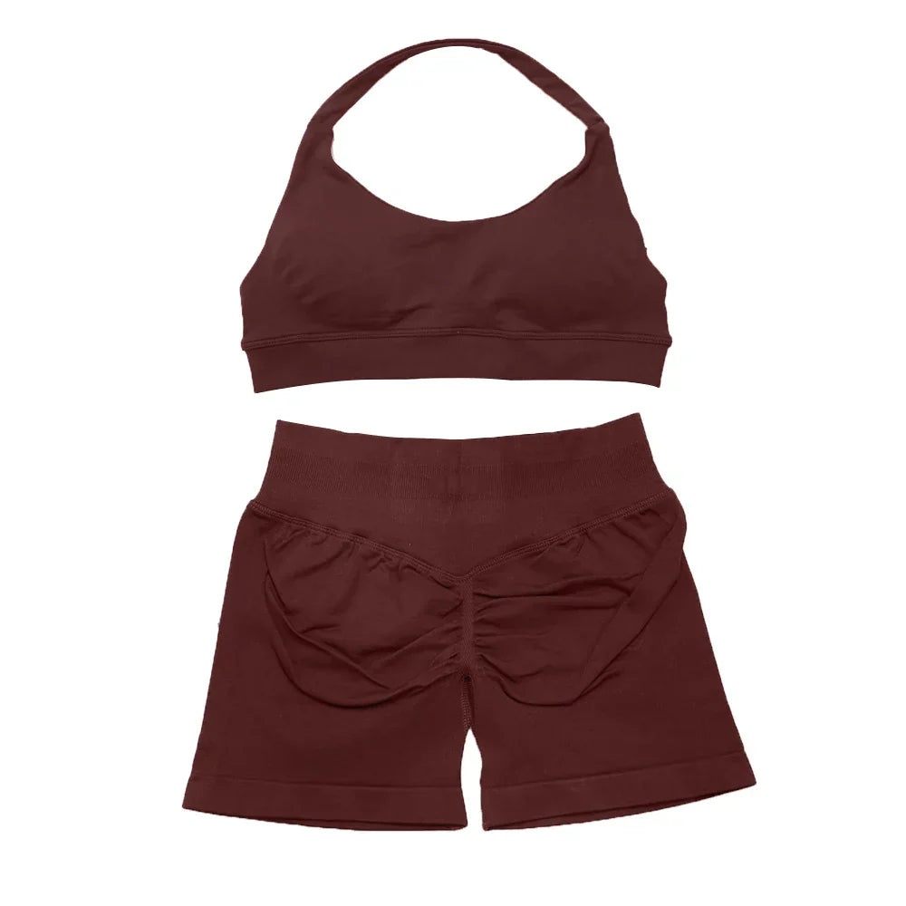 Elite Dynamic Impact Gym Set featuring a matching performance top and leggings with compression support, breathable fabric, and a sleek athletic design