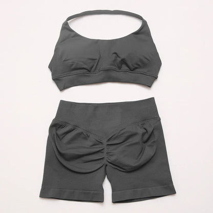 Elite Dynamic Impact Gym Set featuring a matching performance top and leggings with compression support, breathable fabric, and a sleek athletic design