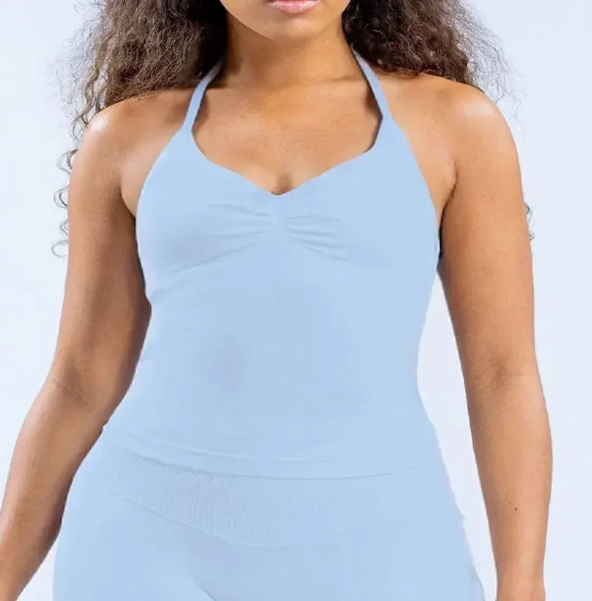 Elite Strappy Yoga Bra Top with crisscross back design, supportive fit, and breathable fabric—perfect for yoga, pilates, or low-impact workouts