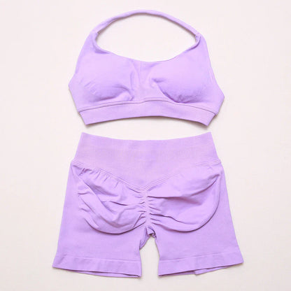 Elite Dynamic Impact Gym Set featuring a matching performance top and leggings with compression support, breathable fabric, and a sleek athletic design